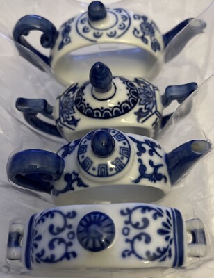 NEW Pier One Tea Time Porcelain Blue & White Teapot Shaped Napkin Rings S/4-image