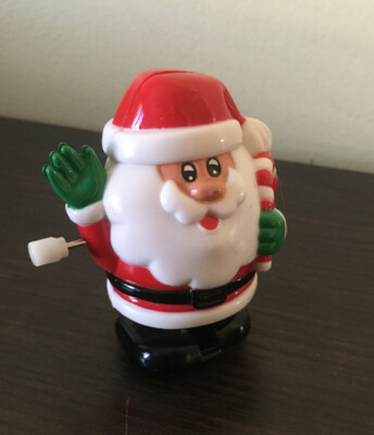 VTG Hard Plastic Wind Up Santa holding Candy Cane Christmas Toy By Fun World -image