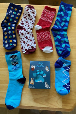 Kitty Cuddles Socks, Pair of Cozy Socks & Six Other Pairs of Socks-image
