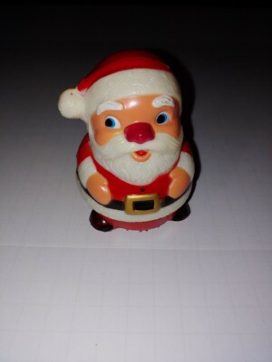 Vintage Christmas Wind-Up Hard Plastic popping Santa Toy Fun World Inc Hong Kong-image