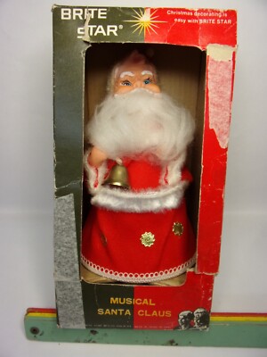 VINTAGE BRITE STAR WIND UP MUSICAL RUBBER FACE SANTA CLAUS W/BELL W/OPEN BOX-image
