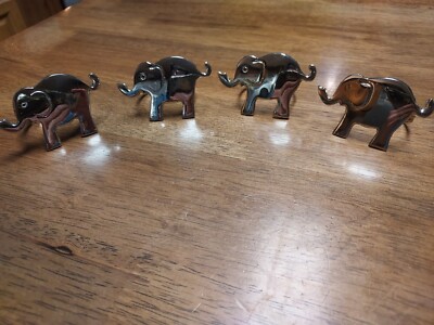 Pier 1 Imports Four Nickel Plated Elephant Design Napkin Rings-image