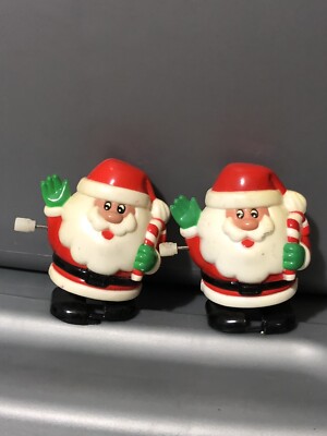 Vtg 2 Fun World Christmas Hard Plastic Wind Up Bobbing Santa Waving Walking Lot-image