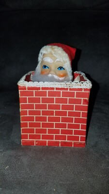 Vintage Wind Up Pop Up & Rotating Santa in Chinmey-image