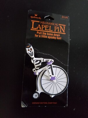 Hallmark Halloween Skeleton Pin Pull String Wind Up Motion Toy Pedals Bike VTG-image