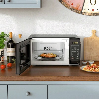 Mainstays 0.7 Cu Ft Countertop Microwave Oven, 700 Watts, Black-image