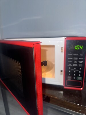 Upgrade Your Kitchen: Mainstays White-Red 0.7 Cu Ft Microwave Oven  WORKING-image