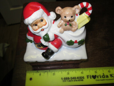 VINTAGE HAND PAINTED SANTA ON CHIMNEY WIND UP- SPINS & PLAYS MUSIC MADE IN JAPAN-image