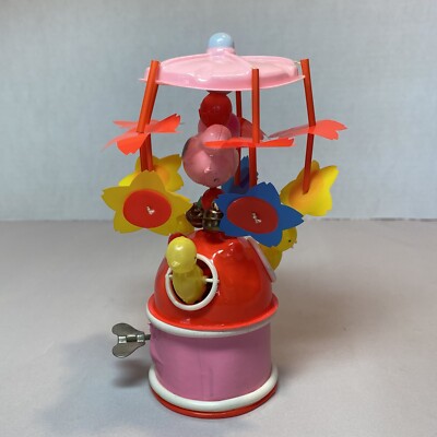 Vintage Celluloid Wind Up Mechanical Easter Chicks on Carousel Toy Easter-image