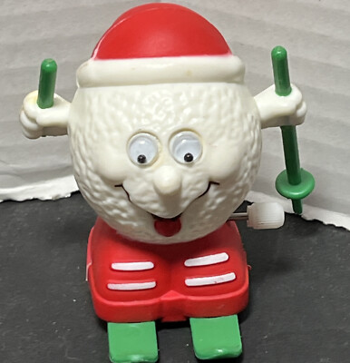 Vintage 1980’s Christmas Russ Berrie Wind Up Snowball Skiing Santa Hat Toy-image