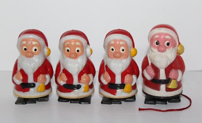4 Vintage Plastic Walking Santa  Christmas Figurine Toys No keys to wind up-image
