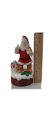 Vintage Wind Up  Musical Santa giving presents By Mann-image